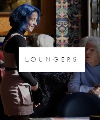 A waitress talking to a customer at the Loungers Restaurant in Preston.